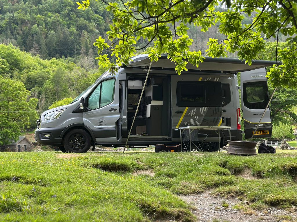 Customer from 365 Camper Hire on a campsite with the Trekker X